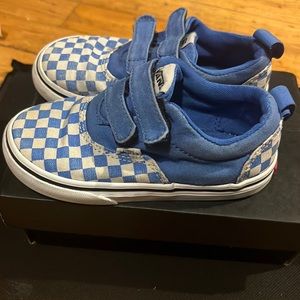 Checkered blue and white strap on Vans